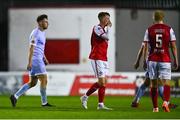 30 September 2022; Chris Forrester of St Patrick's Athletic, centre, leaves the pitch after being sent off by Derek Michael Tomney during the SSE Airtricity League Premier Division match between St Patrick's Athletic and Derry City at Richmond Park in Dublin. Photo by Eóin Noonan/Sportsfile