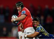 1 October 2022; Ruadhan Quinn of Munster is tackled by Lorenzo Pani of Zebre Parma during the United Rugby Championship match between Munster and Zebre Parma at Musgrave Park in Cork. Photo by Piaras Ó Mídheach/Sportsfile