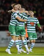 1 October 2022; Daniel Cleary of Shamrock Rovers, left, celebrates with teammates Lee Grace, centre, and Gary O'Neill, right, after scoring their side's first goal during the SSE Airtricity League Premier Division match between Sligo Rovers and Shamrock Rovers at The Showgrounds in Sligo. Photo by Seb Daly/Sportsfile