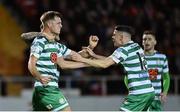 1 October 2022; Daniel Cleary of Shamrock Rovers, left, celebrates with teammates Lee Grace, behind, and Gary O'Neill, right, after scoring their side's first goal during the SSE Airtricity League Premier Division match between Sligo Rovers and Shamrock Rovers at The Showgrounds in Sligo. Photo by Seb Daly/Sportsfile