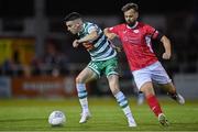 1 October 2022; Gary O'Neill of Shamrock Rovers in action against Greg Bolger of Sligo Rovers during the SSE Airtricity League Premier Division match between Sligo Rovers and Shamrock Rovers at The Showgrounds in Sligo. Photo by Seb Daly/Sportsfile
