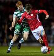 1 October 2022; Paddy Kirk of Sligo Rovers in action against Rory Gaffney of Shamrock Rovers during the SSE Airtricity League Premier Division match between Sligo Rovers and Shamrock Rovers at The Showgrounds in Sligo. Photo by Seb Daly/Sportsfile