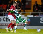 1 October 2022; Dylan Watts of Shamrock Rovers in action against Nando Pijnaker of Sligo Rovers during the SSE Airtricity League Premier Division match between Sligo Rovers and Shamrock Rovers at The Showgrounds in Sligo. Photo by Seb Daly/Sportsfile