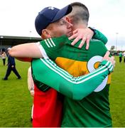 2 October 2022; Michael Quinlivan of Clonmel Commercials is congratulated by Clonmel Commercials manager Tommy Morrissey after their side's victory in the Tipperary County Senior Football Championship Semi-Final match between Moyle Rovers and Clonmel Commercials at Golden Kilfeacle GAA Club in Tipperary. Photo by Michael P Ryan/Sportsfile