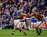 2 October 2022; Diarmaid Conway of Clough/Ballacolla in action against Odhrán Phelan, left, and Darragh Duggan of Camross during the Laois County Senior Hurling Championship Final match between Clough/Ballacolla and Camross at MW Hire O'Moore Park in Portlaoise, Laois. Photo by Piaras Ó Mídheach/Sportsfile