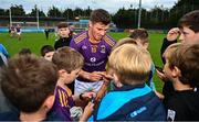 2 October 2022; Shane Walsh of Kilmacud Crokes signs autographs for supporters after the Dublin County Senior Club Football Championship Semi-Final match between Thomas Davis and Kilmacud Crokes at Parnell Park in Dublin. Photo by Eóin Noonan/Sportsfile
