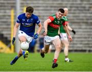 2 October 2022; Darren Hughes of Scotstown in action against Gerard McArdle of Inniskeen during the Monaghan County Senior Club Football Championship Semi-Final match between Inniskeen and Scotstown at St Tiernach's Park in Clones, Monaghan. Photo by Philip Fitzpatrick/Sportsfile