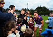 2 October 2022; Shane Walsh of Kilmacud Crokes poses for pictures with supporters after the Dublin County Senior Club Football Championship Semi-Final match between Thomas Davis and Kilmacud Crokes at Parnell Park in Dublin. Photo by Eóin Noonan/Sportsfile