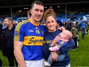 2 October 2022; Man of the match Willie Dunphy of Clough/Ballacolla with his wife Niamh Guy and their daughter Lucy, age thirteen weeks, after victory in the Laois County Senior Hurling Championship Final match between Clough/Ballacolla and Camross at MW Hire O'Moore Park in Portlaoise, Laois. Photo by Piaras Ó Mídheach/Sportsfile