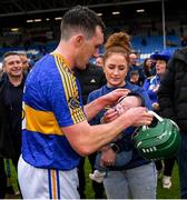 2 October 2022; Man of the match Willie Dunphy of Clough/Ballacolla with his wife Niamh Guy and their daughter Lucy, age thirteen weeks, after victory in the Laois County Senior Hurling Championship Final match between Clough/Ballacolla and Camross at MW Hire O'Moore Park in Portlaoise, Laois. Photo by Piaras Ó Mídheach/Sportsfile