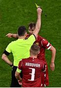 27 September 2022; Hovhannes Hambartsumyan of Armenia is shown a yellow card by referee Rade Obrenovic during UEFA Nations League B Group 1 match between Republic of Ireland and Armenia at Aviva Stadium in Dublin. Photo by Sam Barnes/Sportsfile