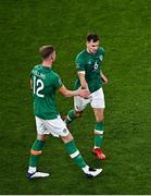 27 September 2022; Jayson Molumby of Republic of Ireland, right, high-fives team-mate Nathan Collins after being substituted during UEFA Nations League B Group 1 match between Republic of Ireland and Armenia at Aviva Stadium in Dublin. Photo by Sam Barnes/Sportsfile