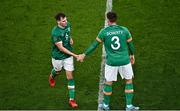 27 September 2022; Jayson Molumby of Republic of Ireland, left, high-fives team-mate Matt Doherty after being substituted during UEFA Nations League B Group 1 match between Republic of Ireland and Armenia at Aviva Stadium in Dublin. Photo by Sam Barnes/Sportsfile