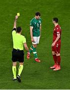 27 September 2022; Jayson Molumby of Republic of Ireland is shown an yellow card by referee Rade Obrenovic during UEFA Nations League B Group 1 match between Republic of Ireland and Armenia at Aviva Stadium in Dublin. Photo by Sam Barnes/Sportsfile