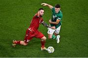 27 September 2022; Tigran Barseghyan of Armenia in action against Dara O'Shea of Republic of Ireland during UEFA Nations League B Group 1 match between Republic of Ireland and Armenia at Aviva Stadium in Dublin. Photo by Sam Barnes/Sportsfile