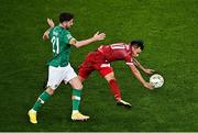27 September 2022; Lucas Zelarayán of Armenia is tackled by Robbie Brady of Republic of Ireland during UEFA Nations League B Group 1 match between Republic of Ireland and Armenia at Aviva Stadium in Dublin. Photo by Sam Barnes/Sportsfile