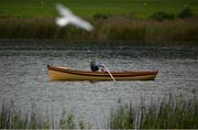 25 September 2022; An oarsman rows across the lake during round four of the KPMG Women's Irish Open Golf Championship at Dromoland Castle in Clare. Photo by Brendan Moran/Sportsfile
