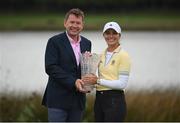 25 September 2022; Klara Spilkova of Czech Republic is presented with her trophy by KPMG managing partner Simon Hand round four of the KPMG Women's Irish Open Golf Championship at Dromoland Castle in Clare. Photo by Brendan Moran/Sportsfile