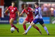 3 October 2022; John Ross Wilson of Shelbourne in action against Jason McClelland of St Patrick's Athletic during the SSE Airtricity League Premier Division match between Shelbourne and St Patrick's Athletic at Tolka Park in Dublin. Photo by Ben McShane/Sportsfile