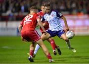 3 October 2022; Billy King of St Patrick's Athletic in action against Kameron Ledwidge of Shelbourne during the SSE Airtricity League Premier Division match between Shelbourne and St Patrick's Athletic at Tolka Park in Dublin. Photo by Tyler Miller/Sportsfile