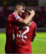 3 October 2022; Sean Boyd of Shelbourne celebrates after scoring his side's third goal with teammate Kameron Ledwidge, right, during the SSE Airtricity League Premier Division match between Shelbourne and St Patrick's Athletic at Tolka Park in Dublin. Photo by Ben McShane/Sportsfile