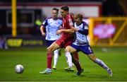 3 October 2022; Sean Boyd of Shelbourne in action against Jamie Lennon of St Patrick's Athletic during the SSE Airtricity League Premier Division match between Shelbourne and St Patrick's Athletic at Tolka Park in Dublin. Photo by Tyler Miller/Sportsfile