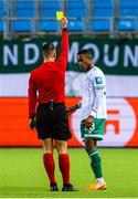 6 October 2022; Aidomo Emakhu of Shamrock Rovers is shown a yellow card by referee Miloš Milanovic during the UEFA Europa Conference League group F match between Molde and Shamrock Rovers at Aker Stadion in Molde, Norway. Photo by Marius Simensen/Sportsfile