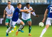6 October 2022; Eirik Haugan of Molde in action against Aidomo Emakhu of Shamrock Rovers during the UEFA Europa Conference League group F match between Molde and Shamrock Rovers at Aker Stadion in Molde, Norway. Photo by Marius Simensen/Sportsfile