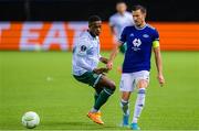6 October 2022; Martin Linnes of Molde in action against Aidomo Emakhu of Shamrock Rovers during the UEFA Europa Conference League group F match between Molde and Shamrock Rovers at Aker Stadion in Molde, Norway. Photo by Marius Simensen/Sportsfile