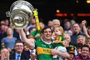 24 July 2022; David Moran of Kerry, with his son Eli, as he lifts the Sam Maguire Cup after the GAA Football All-Ireland Senior Championship Final match between Kerry and Galway at Croke Park in Dublin. Photo by Piaras Ó Mídheach/Sportsfile