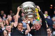 24 July 2022; Harry O'Neill, left, and masseur Liam O'Regan of Kerry lift the Sam Maguire Cup after his side's victory in the GAA Football All-Ireland Senior Championship Final match between Kerry and Galway at Croke Park in Dublin. Photo by Piaras Ó Mídheach/Sportsfile