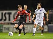 7 October 2022; Jamie Mullins of Bohemians in action against Gary Deegan of Drogheda United during the SSE Airtricity League Premier Division match between Bohemians and Drogheda United at Dalymount Park in Dublin. Photo by Piaras Ó Mídheach/Sportsfile