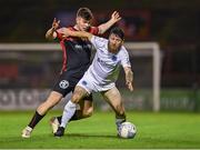 7 October 2022; Gary Deegan of Drogheda United in action against James Clarke of Bohemians during the SSE Airtricity League Premier Division match between Bohemians and Drogheda United at Dalymount Park in Dublin. Photo by Piaras Ó Mídheach/Sportsfile