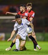 7 October 2022; Gary Deegan of Drogheda United in action against Declan McDaid and James Clarke, behind, of Bohemians during the SSE Airtricity League Premier Division match between Bohemians and Drogheda United at Dalymount Park in Dublin. Photo by Piaras Ó Mídheach/Sportsfile
