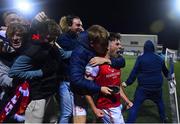 7 October 2022; Adam O'Reilly of St Patrick's Athletic celebrates with teammate Harry Brockbank and supporters after scoring their side's second goal the SSE Airtricity League Premier Division match between Dundalk and St Patrick's Athletic at Casey's Field in Dundalk, Louth. Photo by Seb Daly/Sportsfile