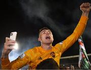 7 October 2022; Cork City goalkeeper David Harrington celebrates with supporters after the SSE Airtricity League First Division match between Cork City and Wexford at Turners Cross in Cork. Photo by Eóin Noonan/Sportsfile