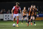 7 October 2022; Barry Cotter of St Patrick's Athletic in action against Alfie Lewis of Dundalk during the SSE Airtricity League Premier Division match between Dundalk and St Patrick's Athletic at Casey's Field in Dundalk, Louth. Photo by Seb Daly/Sportsfile