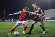 7 October 2022; Sam Curtis of St Patrick's Athletic in action against John Mountney of Dundalk during the SSE Airtricity League Premier Division match between Dundalk and St Patrick's Athletic at Casey's Field in Dundalk, Louth. Photo by Seb Daly/Sportsfile