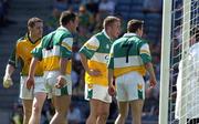 23 May 2004; Offaly players, from left, Padraig Kelly, Scott Brady (4), Shane Sullivan and Karol Slattery (7) argue with an umpire after a shot by Westmeath's Brian Morley was given as a point and was subsequently to be shown as a wide in television replays. Westmeath won the game by one point. Bank of Ireland Leinster Senior Football Championship, Offaly v Westmeath, Croke Park, Dublin. Picture credit;  Matt Browne / SPORTSFILE