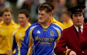 23 May 2004; Roscommon captain Shane Curran leads hid team on the pre-match parade. Bank of Ireland Connacht Senior Football Championship, Roscommon v Sligo, Dr. Hyde Park, Co. Roscommon. Picture credit; Ray McManus / SPORTSFILE