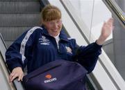 28 May 2004; The Special Olympics Ireland Women's National Football Team, sponsored by eircom, depart for the Eurofoot 2004 European 7-a-side Football Tournament, which will be held in Ettlebruck, Luxembourg from May 28 to June 1. Ireland's Bridget O'Reilly, from Swords, waves goodbye to her family at Dublin airport. Picture credit; Brian Lawless / SPORTSFILE
