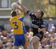 29 May 2004; Paul Taylor, Sligo, in action against Michael Ryan, Roscommon. Bank of Ireland Connacht Senior Football Championship Replay, Sligo v Roscommon, Markievicz Park, Sligo. Picture credit; Damien Eagers / SPORTSFILE