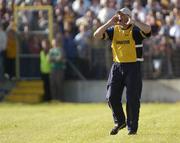 29 May 2004; Roscommon manager Tommy Carr urges his team on during the game. Bank of Ireland Connacht Senior Football Championship Replay, Sligo v Roscommon, Markievicz Park, Sligo. Picture credit; Damien Eagers / SPORTSFILE
