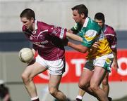 23 May 2004; David O'Shaughnessy, Westmeath, in action against James Grennan, Offaly. Bank of Ireland Leinster Senior Football Championship, Offaly v Westmeath, Croke Park, Dublin. Picture credit; Brian Lawless / SPORTSFILE