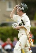 30 May 2004; Ireland's Peter Gillespie makes his way back to the pavillion after being bowled out. C&G Trophy 3rd Round, Ireland v Northamptonshire CCC, Clontarf Cricket Club, Clontarf. Dublin. Picture credit; Pat Murphy / SPORTSFILE