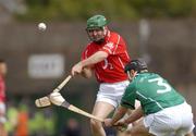 30 May 2004; Jerry O'Connor, Cork, is tackled by TJ Ryan, Limerick. Guinness Munster Senior Hurling Championship Semi-Final, Limerick v Cork, Gaelic Grounds, Limerick. Picture credit; Ray McManus / SPORTSFILE