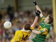 30 May 2004; Raymond Sweeney, Donegal, in action against Darren O'Hare, Antrim. Bank of Ireland Ulster Senior Football Championship, Donegal v Antrim, McCool Park, Ballybofey, Co. Donegal. Picture credit; Damien Eagers / SPORTSFILE