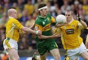 30 May 2004; Christy Toye, Donegal, in action against Anto Finnegan, left, and Colin Brady, Antrim. Bank of Ireland Ulster Senior Football Championship, Donegal v Antrim, McCool Park, Ballybofey, Co. Donegal. Picture credit; Damien Eagers / SPORTSFILE