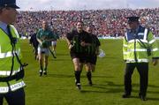 30 May 2004; Referee Seamus Roche leaves the field. Guinness Munster Senior Hurling Championship Semi-Final, Limerick v Cork, Gaelic Grounds, Limerick. Picture credit; Ray McManus / SPORTSFILE