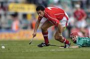 30 May 2004; Sean Og O hAailpin, Cork, is tackled by Mike McKenna, Limerick. Guinness Munster Senior Hurling Championship Semi-Final, Limerick v Cork, Gaelic Grounds, Limerick. Picture credit; Ray McManus / SPORTSFILE